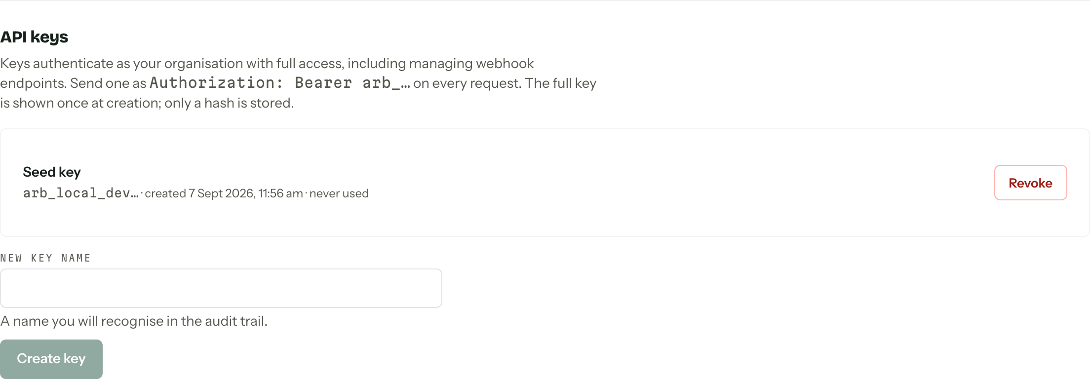The API keys section of the integrations screen, listing one key with its prefix and creation date beside a Revoke button.