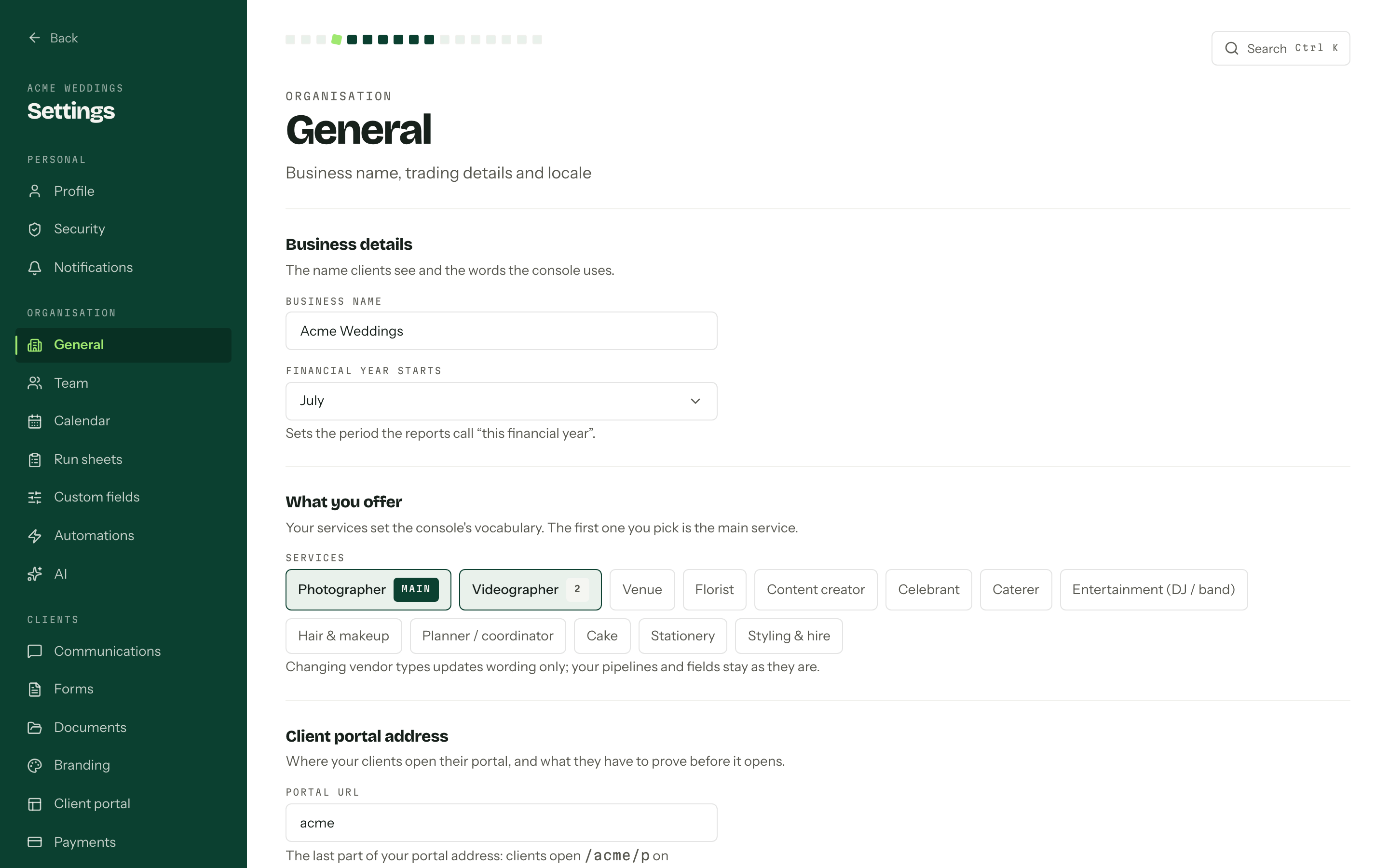 The organisation settings page showing Business name, the What you offer vendor grid with Photographer marked main, Financial year starts, Portal URL and the portal email confirmation checkbox.